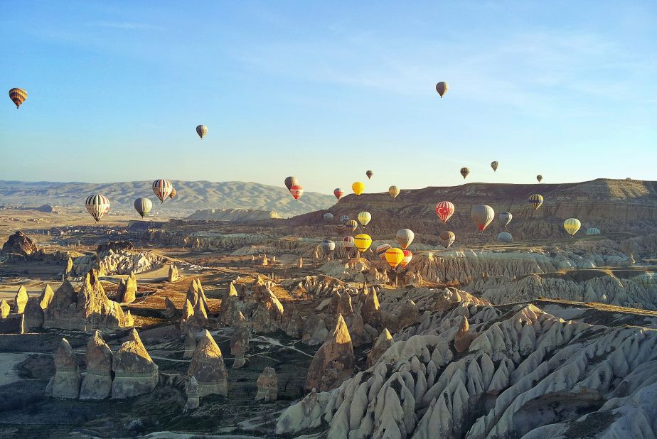 A <a href="http://ireport.cnn.com/docs/DOC-1112806">hot air balloon trip</a> is a popular way to take in the stunning views of Central Turkey's <a href="http://www.tanitma.gov.tr/TR,22529/tatil-yerleri-destinasyonlar.html" target="_blank" target="_blank">Goreme National Park</a> and its unusual volcanic rock formations, known as "fairy chimneys." 