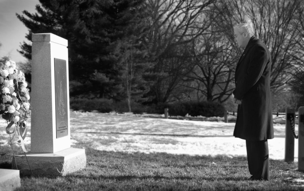 NASA Administrator Sean O'Keefe visits Arlington National Cemetery to lay a wreath honoring the crew of the Space Shuttle Columbia on February 1, 2005.