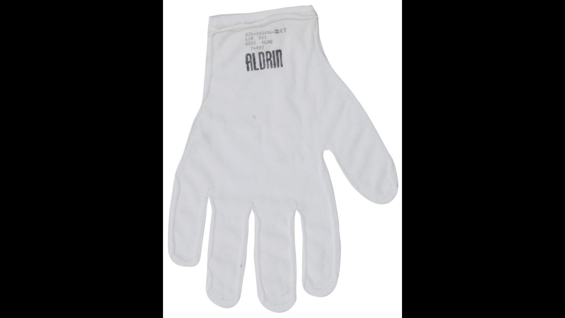 This nylon glove liner was worn by astronaut Buzz Aldrin under his pressurized gloves on the lunar surface during the historic Apollo 11 mission. His name is stamped in the fabric. Sold for $61,212.