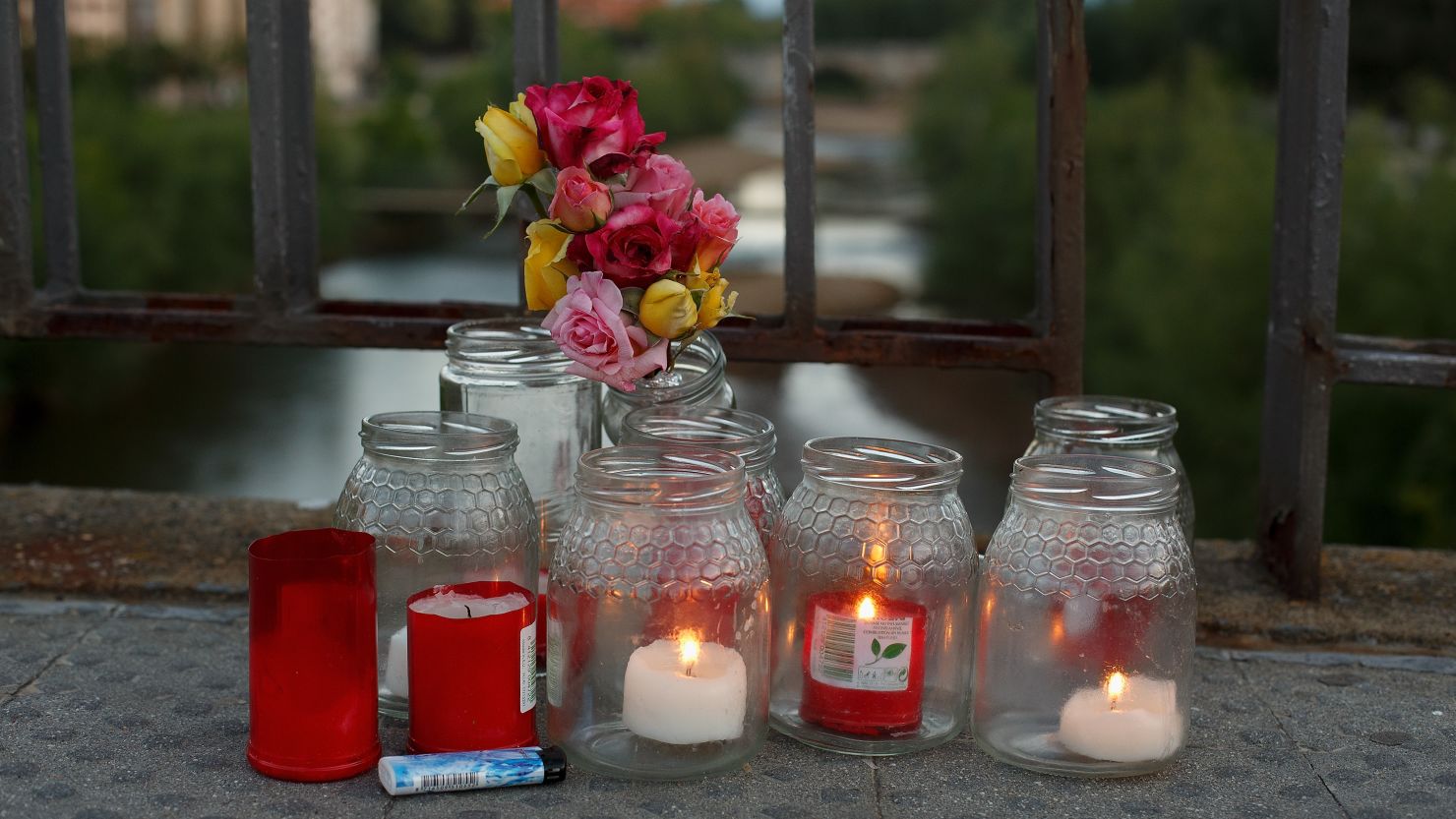  Flowers and candles lay on the bridge where Isabel Carrasco was killed on May 13, 2014 in Leon, Spain.