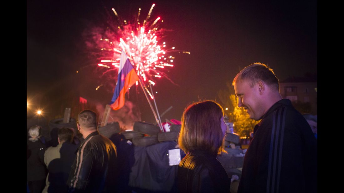 People celebrate with fireworks in Donetsk on May 12 as separatists declared independenc