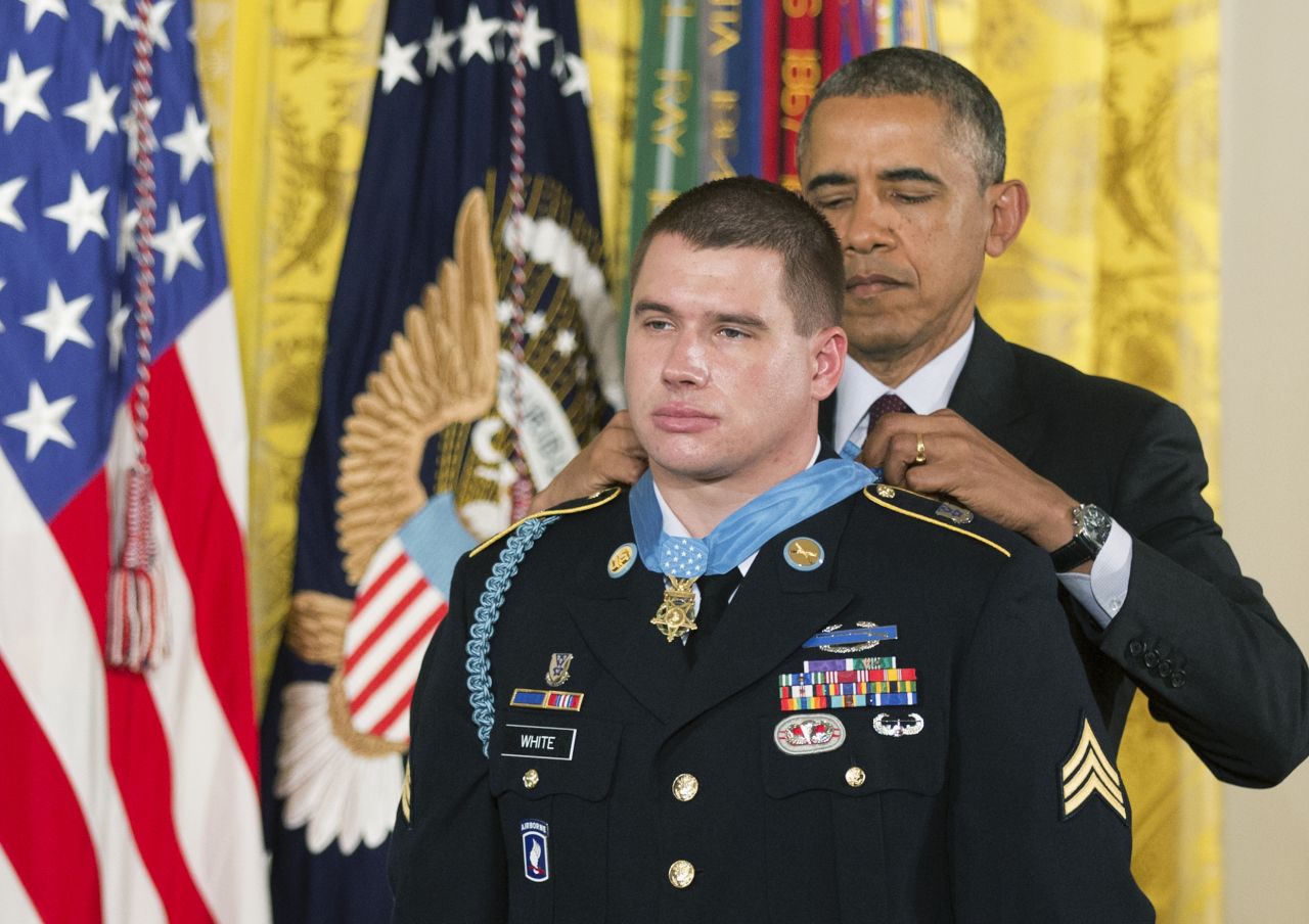 Army Sgt. Kyle White receives the Medal of Honor during a ceremony at the White House in May. He was recognized for repeatedly exposing himself to enemy fire in Afghanistan while trying to save the lives of fellow soldiers in November 2007.