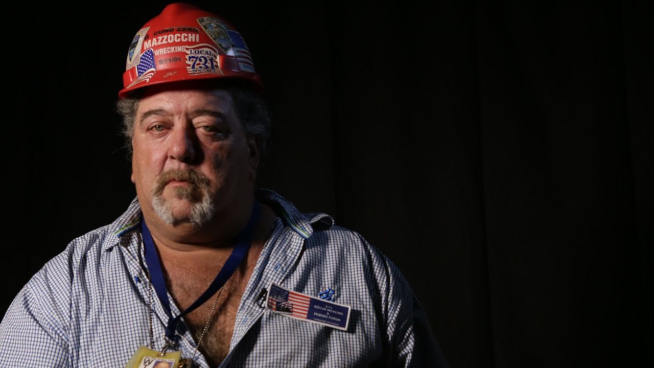 Construction worker Frank Silecchia found a crossbeam in the rubble that resembled a cross. It became a key exhibit at the new museum.