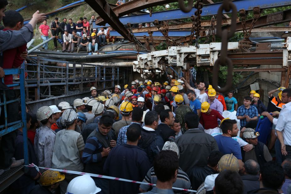 Rescue workers and relatives gather at the mine on May 13.