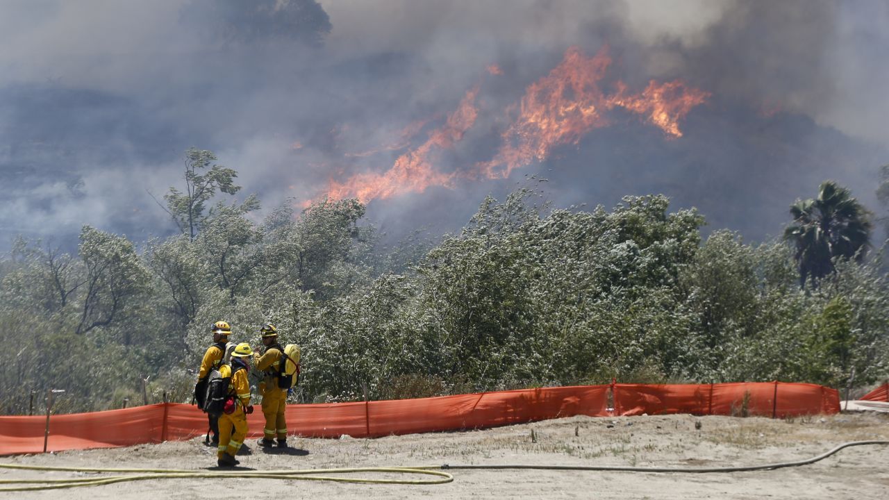 Firefighters prepare to take on a wildfire in San Diego.