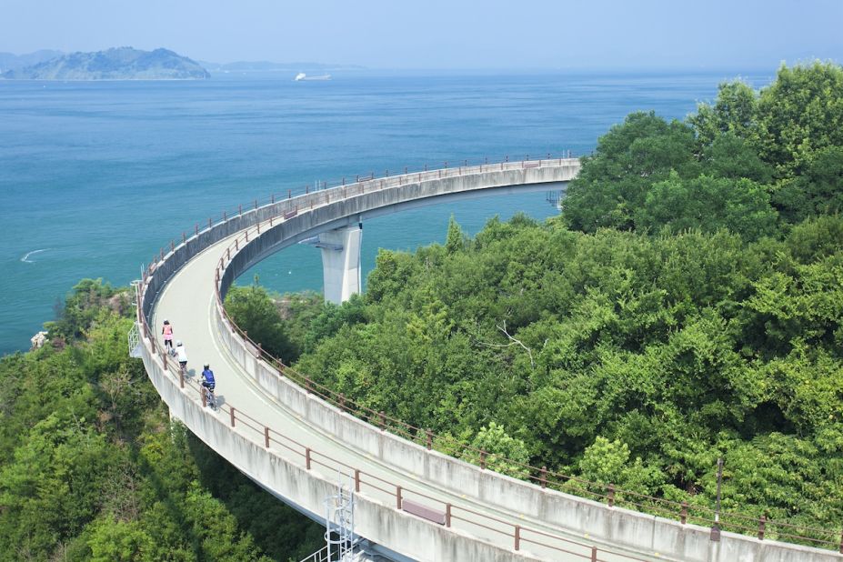 Shimanami Kaido is a 60-kilometer-long road and bridge network running between Japan's Hiroshima and Ehime prefectures. The route connects across several islands, offering sublime views of the Seto Inland Sea National Park. 