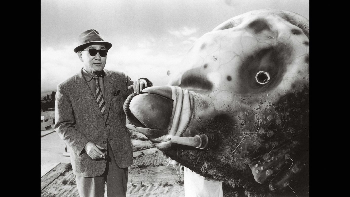Tsuburaya and the 33-foot Mothra "costume" in 1961. Note the detailed miniature fields in the background.  