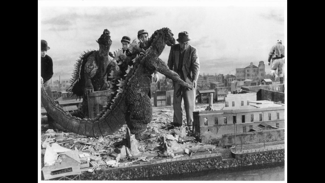 Tsuburaya supervises an effects scene from 1955's "Godzilla Raids Again." The Godzilla costume was considerably thinner than the one used in the first movie. 