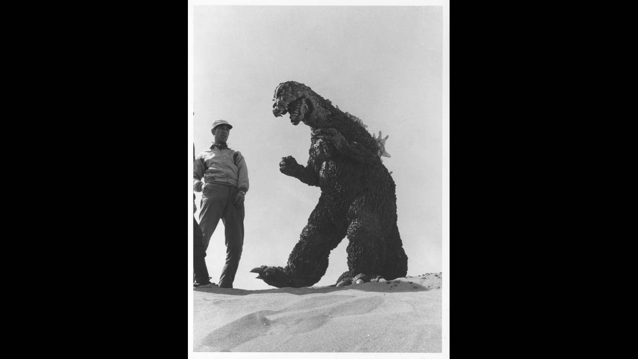 Godzila on the beach, shooting a scene for the U.S. version of 1964's "Mothra vs. Godzilla."