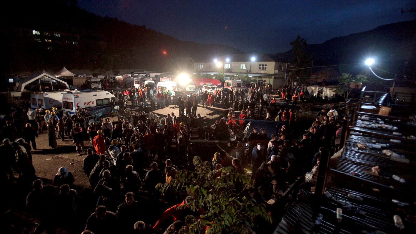 Miners and relatives wait for news outside the mine on May 14.
