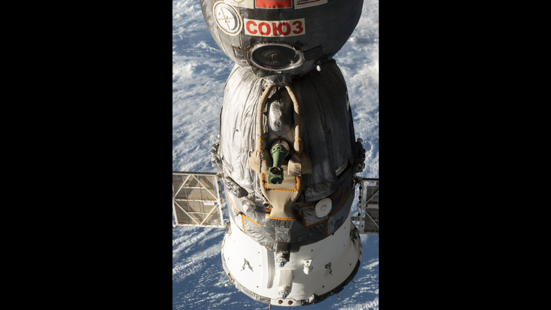 A Russian Soyuz spacecraft is docked with the space station on May 5. Since the U.S. shuttle program ended in 2011, all crew members are ferried to and from the space station on Russian rockets. 