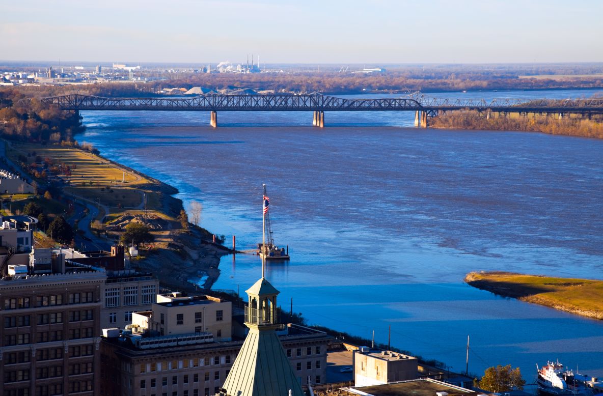 Just across a bluff from Mississippi, the city of Memphis, Tennessee, rose from the cotton fortunes across the state line. It's the perfect spot to start a Delta visit and serves as the region's unofficial capital. The mighty Mississippi River, shown here, is seen from Memphis.
