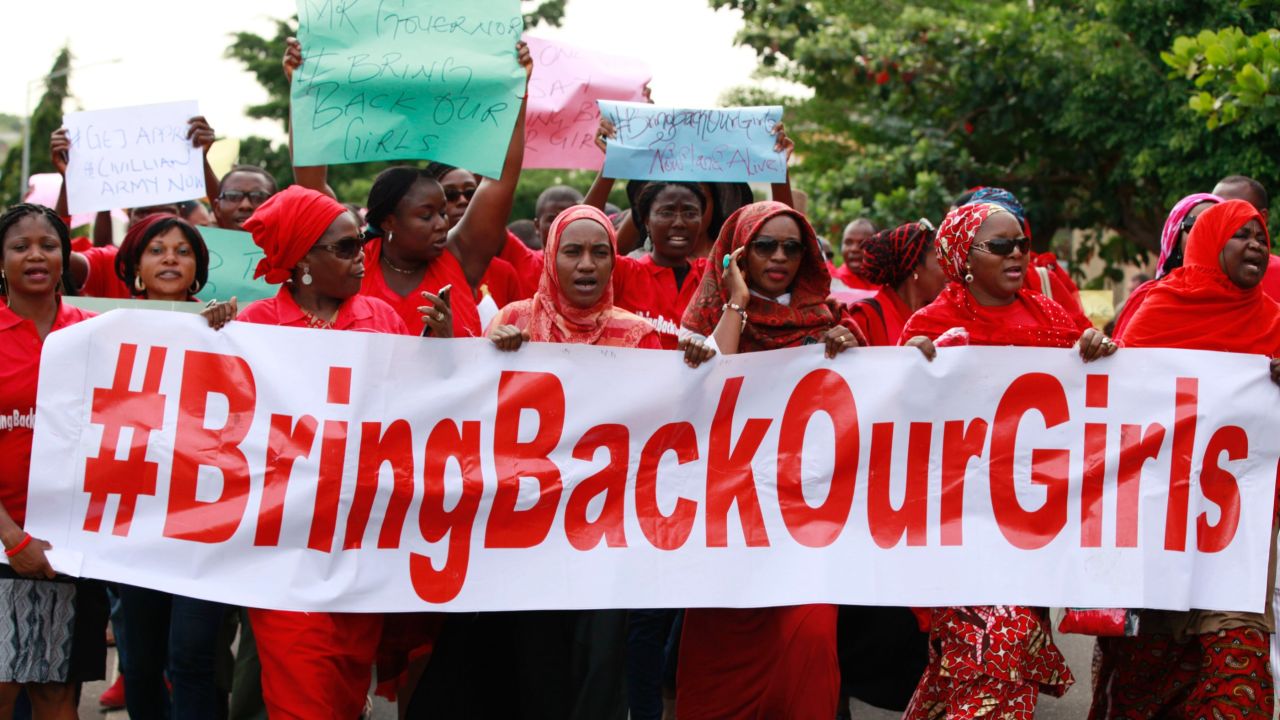 Women attend a demonstration calling on the government to rescue the kidnapped schoolgirls of the Chibok secondary school, in Abuja, Nigeria, Tuesday, May 13, 2014.