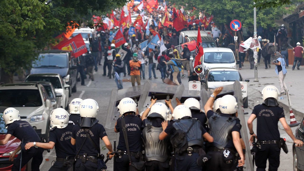 Protesters clash with riot police in Ankara on May 14.