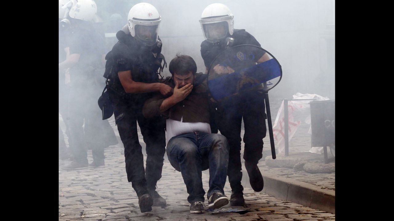 Police arrest a protester in Ankara on May 14.