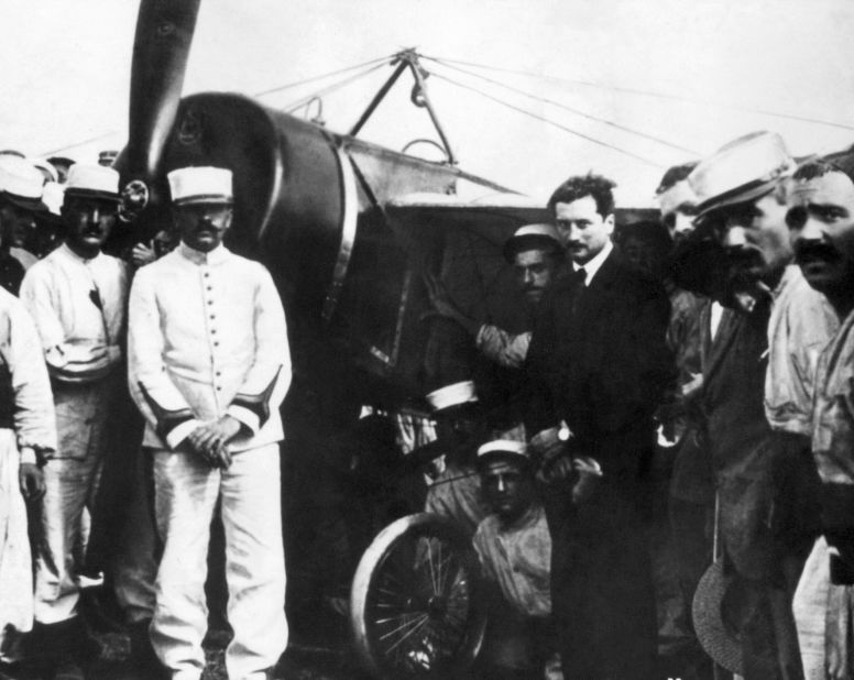 Garros (fourth from the right) poses among Spahis of the French army in front of the Morane-Saulnier plane which he piloted across the Mediterranean Sea on September 23, 1913.