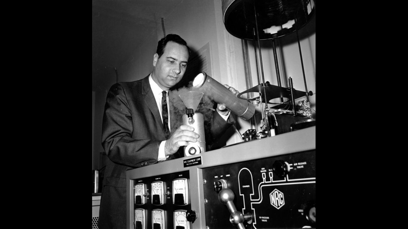 Theodore Maiman pours liquid nitrogen into a cooling unit around one of the first experimental lasers in his laboratory in Santa Monica, California. Maiman's ruby laser, created on May 16, 1960, is considered to be one of the top technological achievements of the 20th century. It paved the way for fiber-optic communications, CDs, DVDs and sight-restoring surgery.  