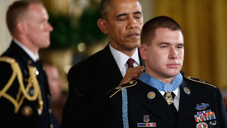 U.S. President Barack Obama awards the Medal of Honor to Army Sgt. Kyle J. White during a White House ceremony on Tuesday, May 13. White was recognized for repeatedly exposing himself to enemy fire in Afghanistan while trying to save the lives of fellow soldiers in November 2007. He is the 10th person to receive the military's highest honor for actions in Afghanistan. <a href="http://www.cnn.com/2014/05/13/politics/gallery/afghanistan-vets-medal-of-honor/index.html">See all 10</a>