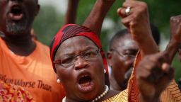 A woman shouts slogans, during a rally calling on the Government to rescue the school girls kidnapped from the Chibok Government secondary school, in Abuja, Nigeria, Sunday May 11, 2014.