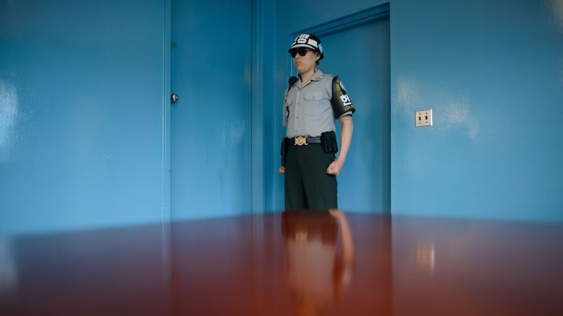 A South Korean soldier stands guard inside a Military Armistice Committee meeting room Wednesday, May 14, at the truce village of Panmunjom, in the demilitarized zone between North and South Korea.