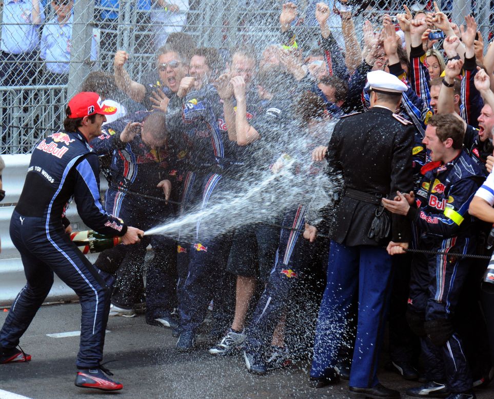 "Generally we try to spray the police but they're a bit serious," says Webber, shown here taking aim during one of his champagne moments in Monaco.