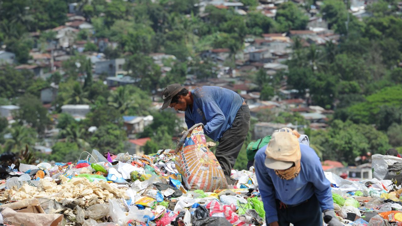 Scavengers pick through the rubbish at Payatas, a vast garbage dump to the northeast of Manila.