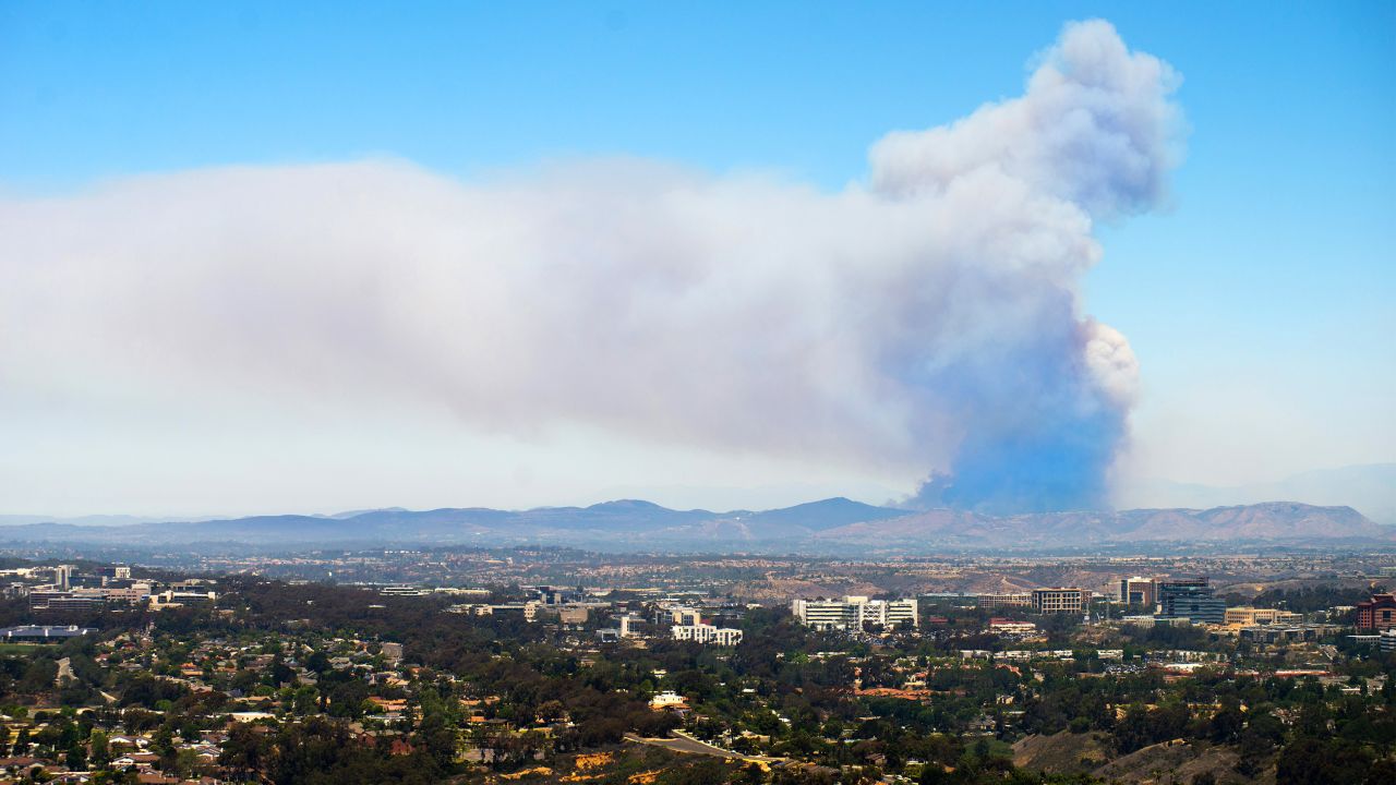 A huge plume of smoke in San Marcos is seen on May 15 from atop Mount Soledad in La Jolla, California.