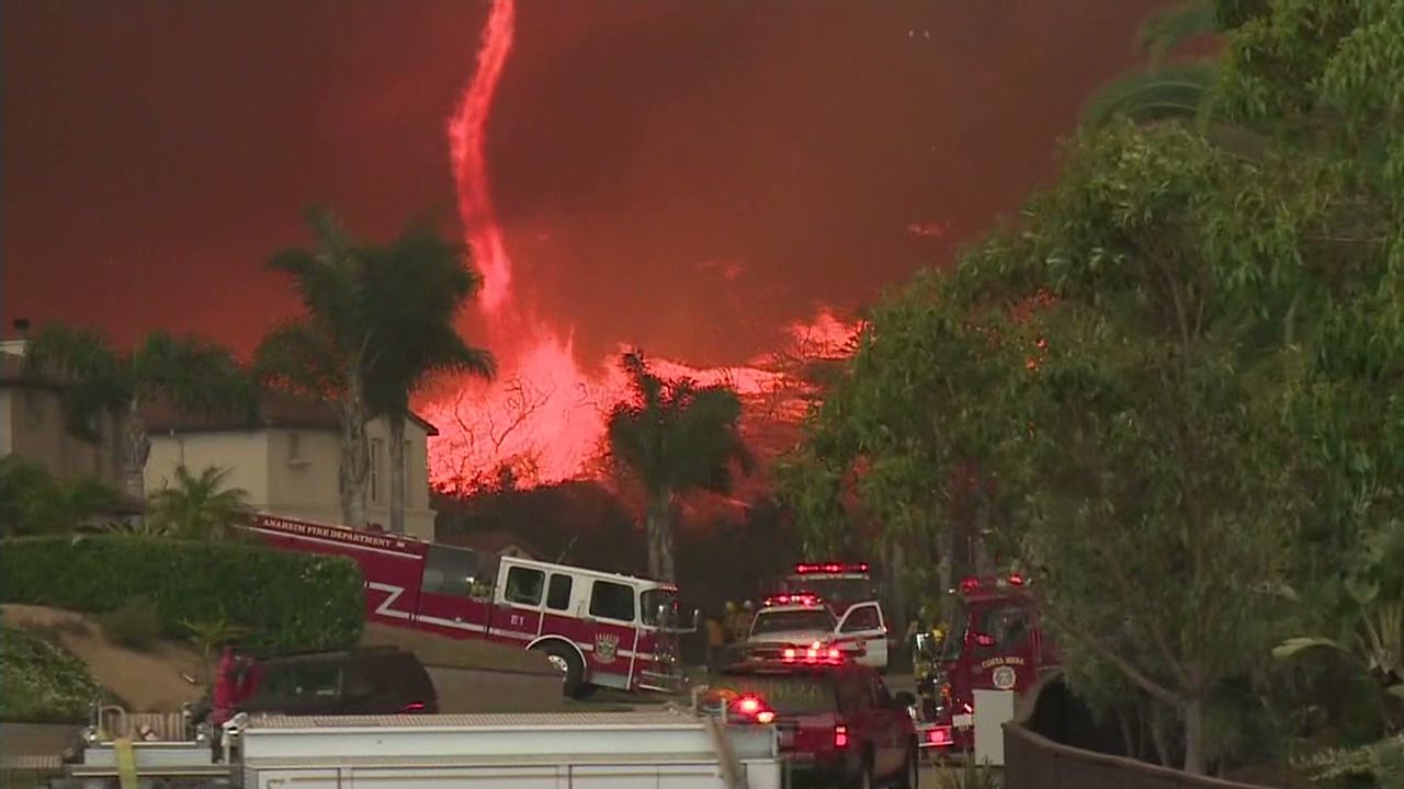 A fire tornado erupts near San Diego, California in 2014.