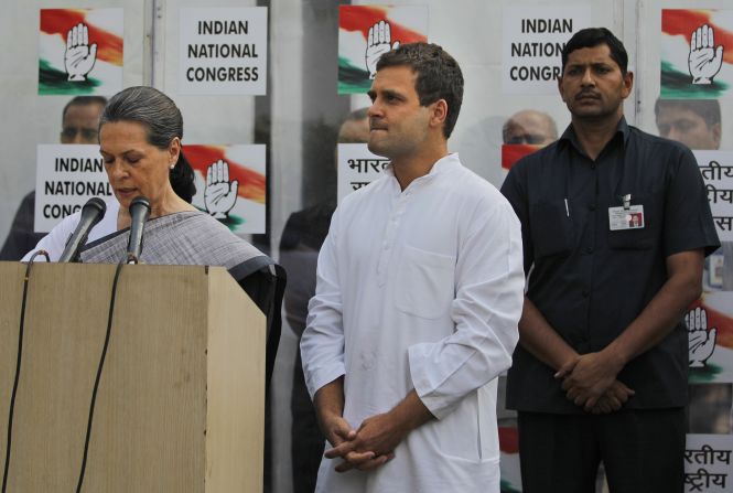Sonia Gandhi, leader of the Indian National Congress, addresses reporters May 16 outside party headquarters in New Delhi, with her son and party Vice President Rahul Gandhi at her side. Rahul Gandhi said he took responsibility for the defeat of the Congress party, which had dominated Indian politics since the nation's independence in 1947.