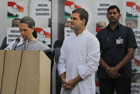 Sonia Gandhi, leader of the Indian National Congress, addresses reporters May 16 outside party headquarters in New Delhi, with her son and party Vice President Rahul Gandhi at her side. Rahul Gandhi said he took responsibility for the defeat of the Congress party, which had dominated Indian politics since the nation's independence in 1947. 