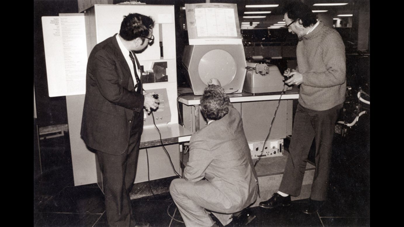 In 1962, Massachusetts Institute of Technology students Steve Russell, Martin "Shag" Graetz and Alan Kotok created "Spacewar!" which is widely considered the first interactive video game. Dueling players fired at each other's spaceships using early versions of joysticks. This photo shows the three "Spacewar!" inventors playing the game at Boston's Computer Museum in 1983.