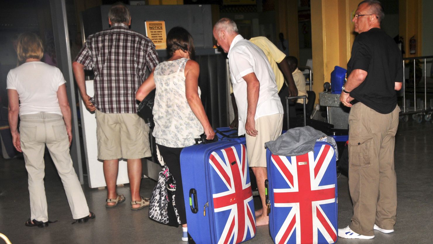 British tourists queue to prepare to leave the international airport in Mombasa, Kenya on May 15, 2014.