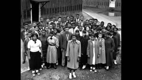 Among the other cases attached to Brown v. Board of Education was Dorothy Davis, et al. v. County School Board of Prince Edward County, Virginia. Pictured are some of the more than 100 students named in that case. The lawsuit initially sought repairs to Robert Moton High School, a segregated school in Farmville, Virginia. The suit was named for Dorothy E. Davis, pictured in the center with glasses.