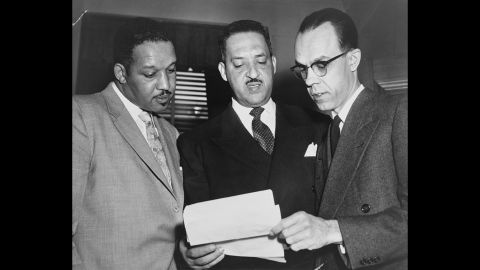 From left, lead lawyers Harold P. Boulware, Thurgood Marshall and Spottswood W. Robinson III confer at the US Supreme Court prior to presenting arguments in 1953. Marshall, the NAACP's Special Counsel and lead counsel for the plaintiffs, argued the case before the Supreme Court.