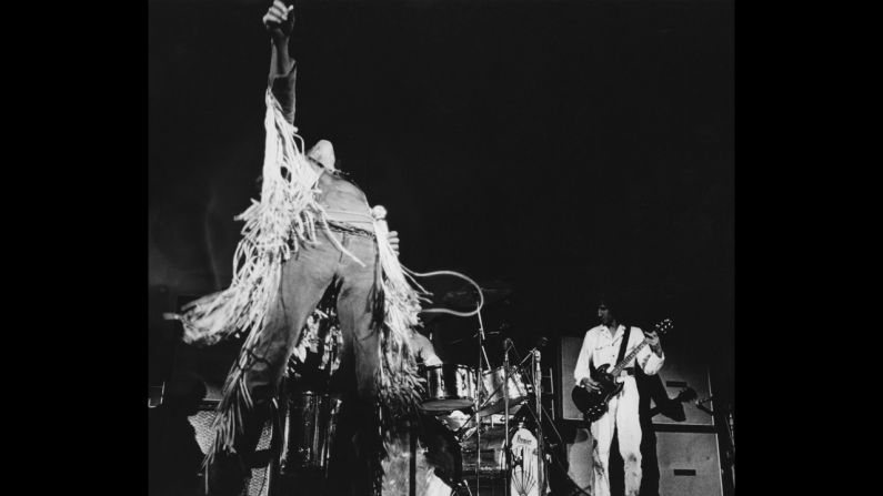 Singer Roger Daltrey and guitarist Pete Townshend of The Who perform on stage at the Woodstock Music Festival in Bethel, New York. An estimated 400,000 people attended the festival, which took place in August 1969.