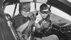 1966:  Actors Adam West (left) and Burt Ward as Batman and Robin in the Batmobile in a still from the television series, 'Batman'.  (Photo by Hulton Archive/Getty Images)