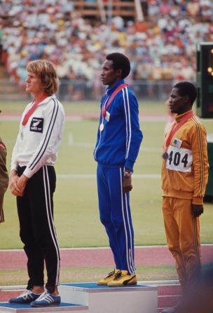 However, Bayi, pictured here during the medal ceremony at the 1974 Commonwealth Games, says that many forget his achievements because he never took a medal at the Olympic Games. 