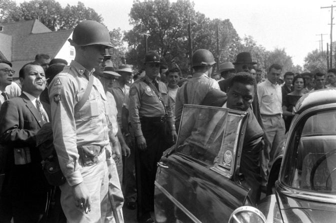 Members of the Little Rock Nine arrive at school, only to be turned away by Arkansas National Guardsmen.