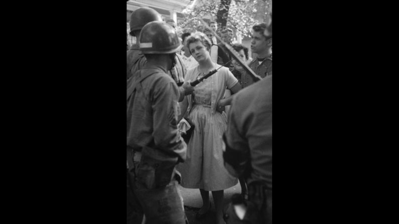Within days, President Dwight Eisenhower underscored the government's commitment to the Supreme Court's decision by sending in troops from the Army's 101st Airborne to Little Rock to ensure the teens' safety. Here, soldiers square off against anti-integration protesters. Eight of the nine completed that school year. <a href="index.php?page=&url=http%3A%2F%2Flife.time.com%2Fhistory%2Flittle-rock-nine-1957-photos%2F%231" target="_blank" target="_blank">See more of LIFE's coverage of the Little Rock Nine</a>.