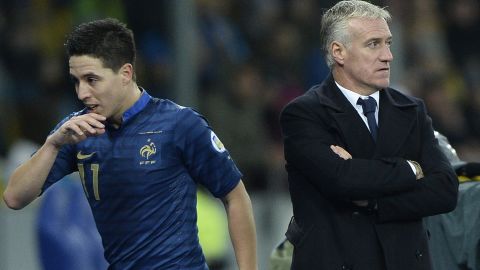 Samir Nasri (left) was omitted from France's World Cup squad by national coach Didier Deschamps (right).