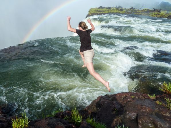 If you're brave enough, you can jump into Devil's Pool, just above the falls on the Zambian side in <a href="http://www.zimparks.org/index.php/parks-overview/national/national-parks" target="_blank" target="_blank">Victoria Falls National Park</a>, as <a href="http://ireport.cnn.com/docs/DOC-1129760">Dirkse</a> did here. "When the water is low, you can jump into the pool, where a natural rock wall stops you just at the edge of the falls," Dirkse said. "It's an exhilarating experience."