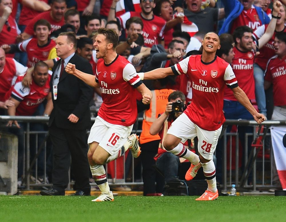 Aaron Ramsey (left) celebrates after scoring the winning goal for Arsenal against Hull City in the FA Cup final on Saturday. 