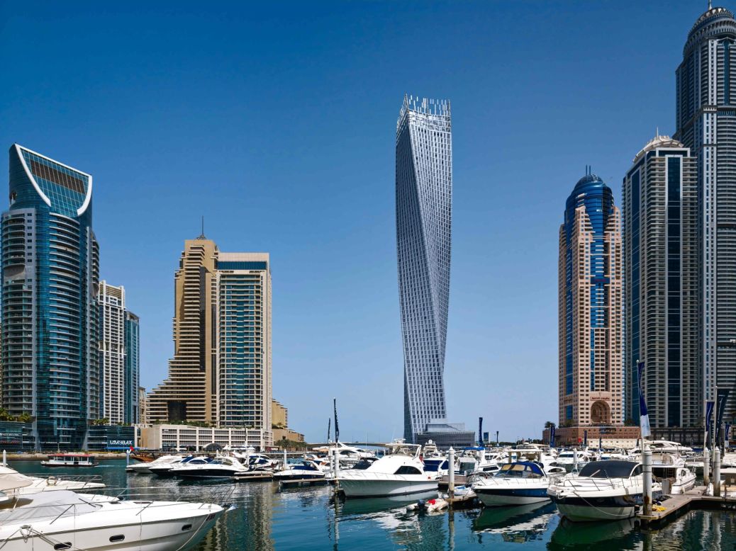 Este edificio de Dubái es la torre más alta del mundo, teniendo un giro de 90 grados. La forma del edificio reduce la fuerza del viento sobre la torre y canaliza el viento de tal manera que su fuerza no puede organizarse. Cada piso está rotado a 1,2 grados para lograr el espiral total de 90 grados, creando la forma de una hélice. Arquitectos: Skidmore, Owings & Merrill, Khatib & Alami Dubai