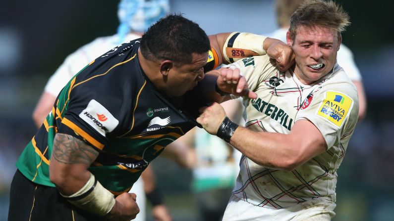 Northampton rugby player Salesi Ma'afu, left, hits Leicester's Tom Youngs during an English Premiership semifinal match Friday, May 16, in Northampton, England. Ma'afu was sent off by the referee for the punch, but Northampton won 21-20 to book a spot in the final against Saracens. There were no hard feelings afterward: Youngs congratulated Ma'afu on Twitter and wished him well in the final, and Ma'afu responded by tweeting "I owe you a pint."