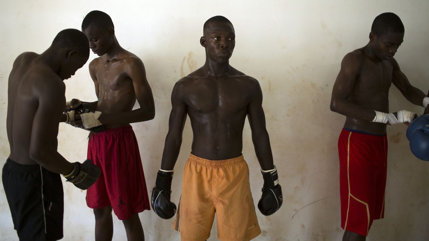 Men take part in Thai boxing training Wednesday, May 14, at the Barthelemy Boganda Stadium in Bangui, Central African Republic.