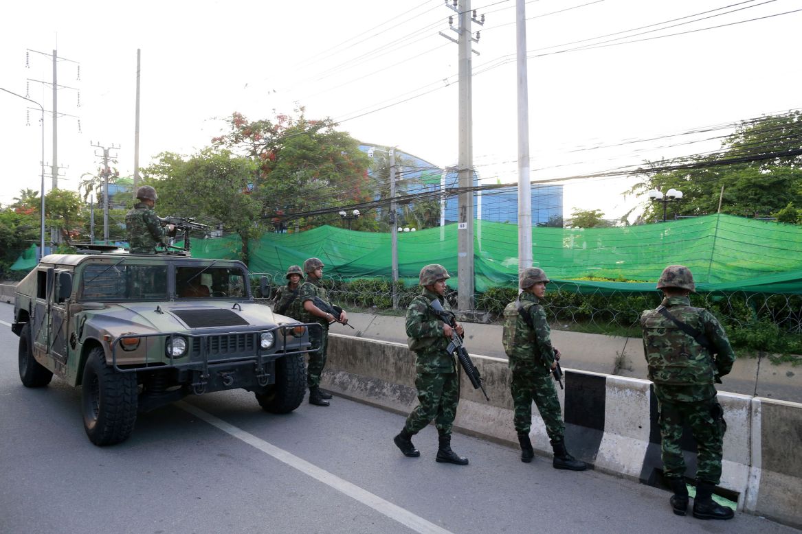 A group of soldiers gathers outside the Centre for the Administration of Peace and Order on May 20.