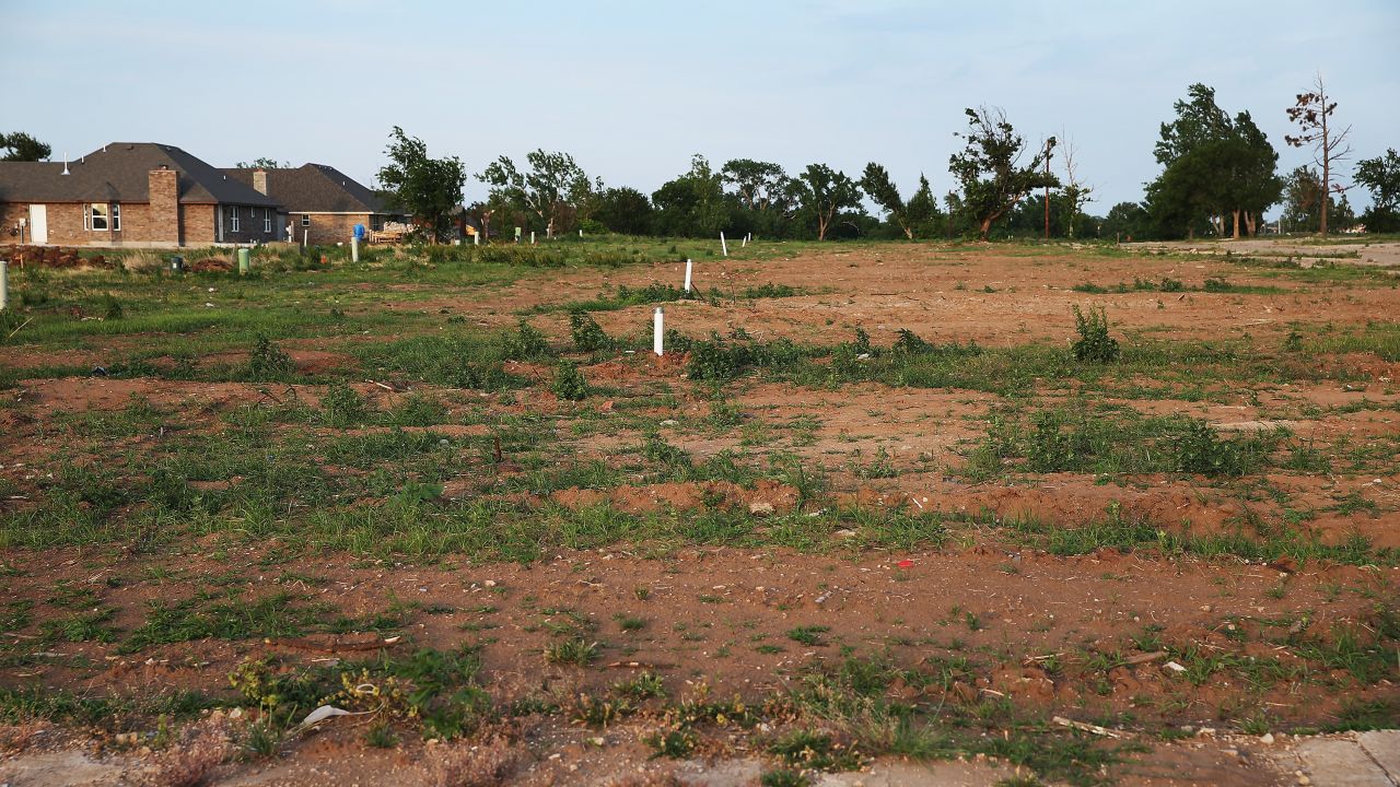 <strong>Now: </strong>The same neighborhood is seen on May 18, 2014, one year after all the homes were destroyed.