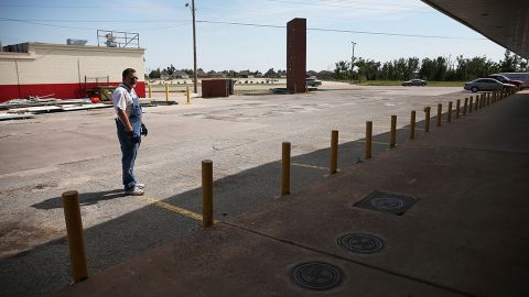 <strong>Now: </strong>Walker stands in front of his business on May 18, 2014.