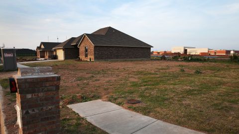 <strong>Now:</strong> New homes stand beside empty lots in the neighborhood on May 18, 2014.