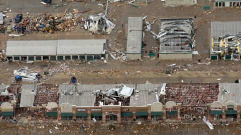 <strong>Then: </strong>An aerial view of damaged businesses on May 21, 2013